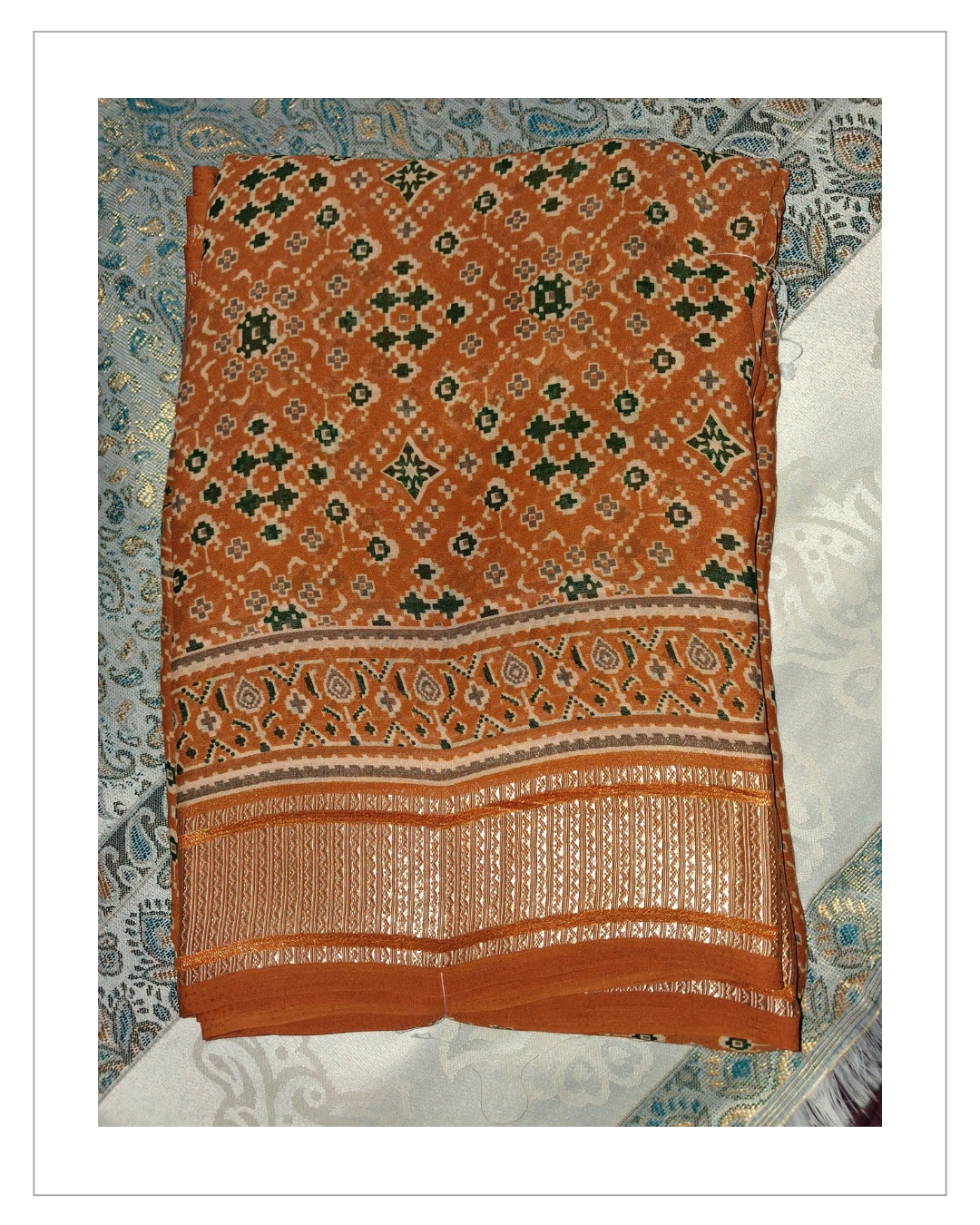 Orange Printed Designer Saree with Elegant Golden Border