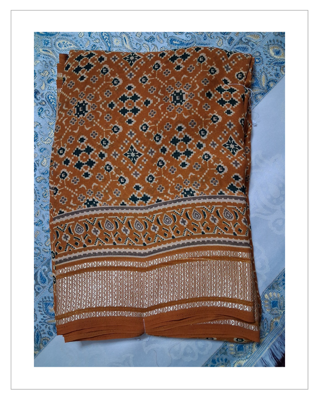 Orange Printed Designer Saree with Elegant Golden Border