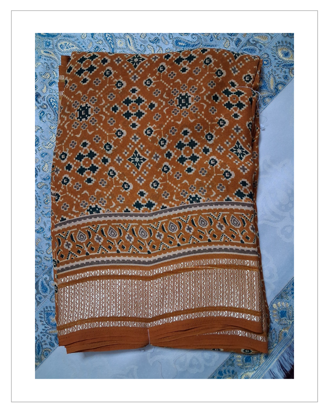Orange Printed Designer Saree with Elegant Golden Border